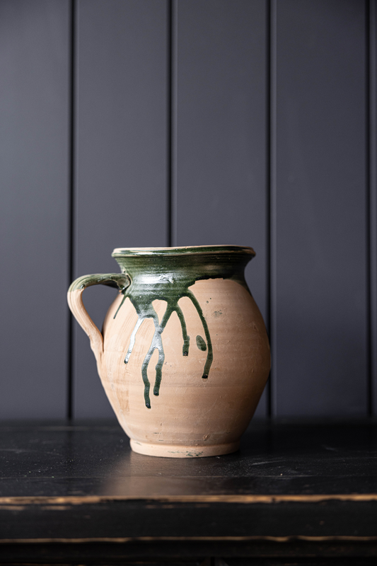 Luxe B Co terracotta green drip replica vase, one of a kind, with a textured, handcrafted appearance and unique drip design.