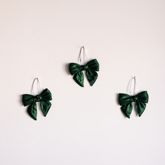 Set of three emerald green gauze bows from Luxe B Co, soft and lightweight decorative hair accessories.