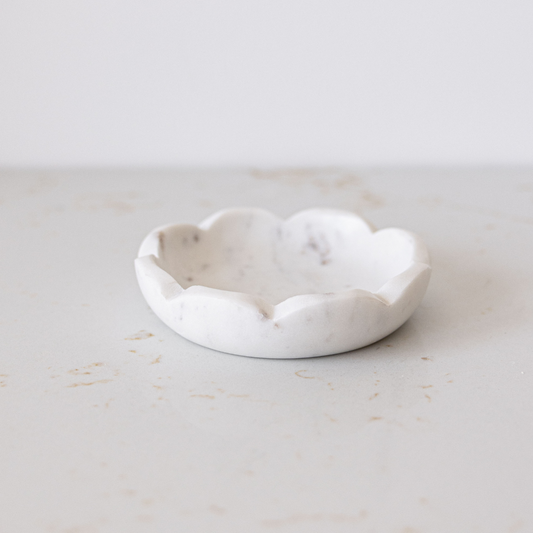 Marble petal-shaped decorative bowl by Luxe B Co, showcasing smooth marble surface and elegant floral design.