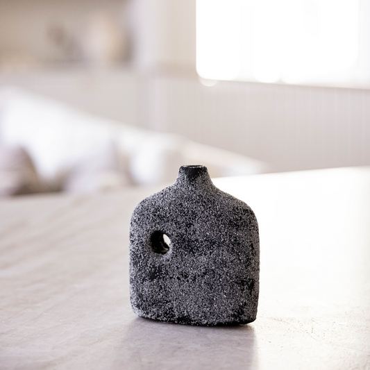 Black terracotta Milos Vase by Luxe B Co, showcasing its smooth surface and modern design for stylish home decor.