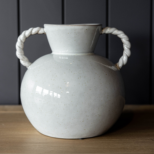 Creative Co-op Positano twisted handle vase featuring a unique design and elegant shape, perfect for decorative display.