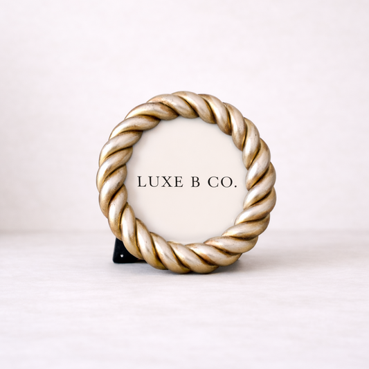 Round resin rope photo frame by Luxe B Co, featuring a circular design with textured rope detailing for decorative display.