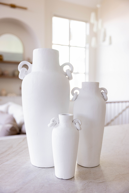 Terracotta Santorini Urn Link Vase from Luxe B Co featuring a textured, earthy design suitable for home decor.