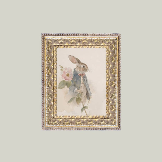 Framed watercolor bunny art by Luxe B Co featuring antique-inspired floral and pastel design on textured paper.