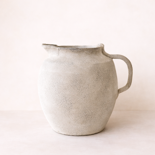Cream ceramic Revival Jug vase by Luxe B Co, featuring a sleek pitcher design perfect for floral arrangements.
