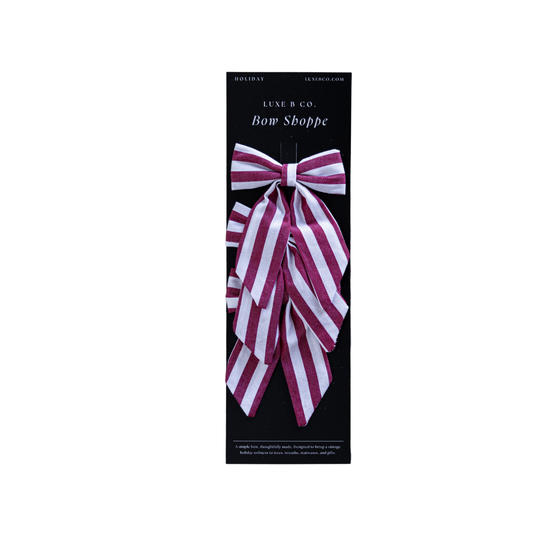 Set of red striped mini fabric bows with clips for holiday decorations, perfect for festive craft and gift embellishments.