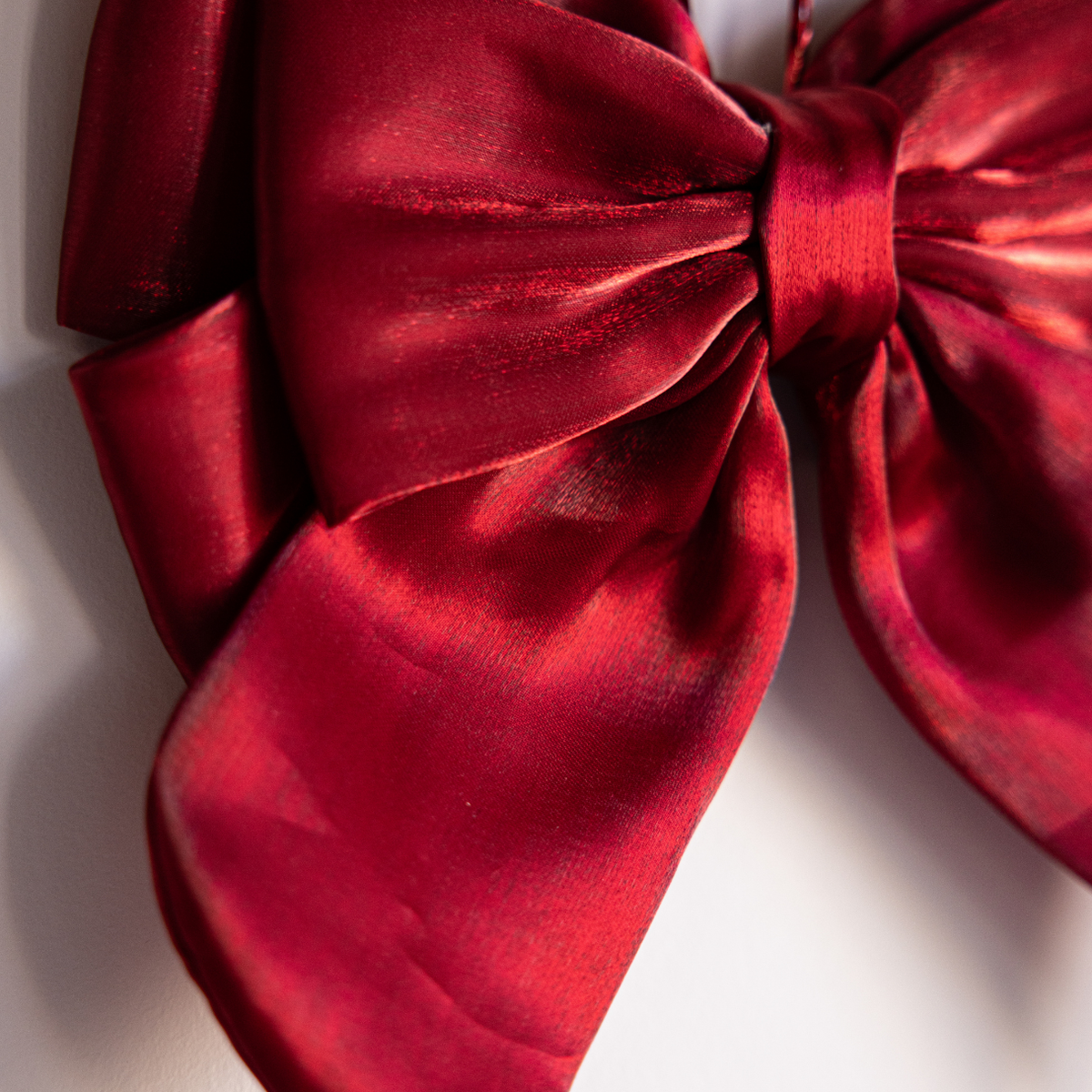 Red Gauze Bold Bow by Luxe B Co, large soft fabric bow with a striking design, perfect for hair accessories or decoration.