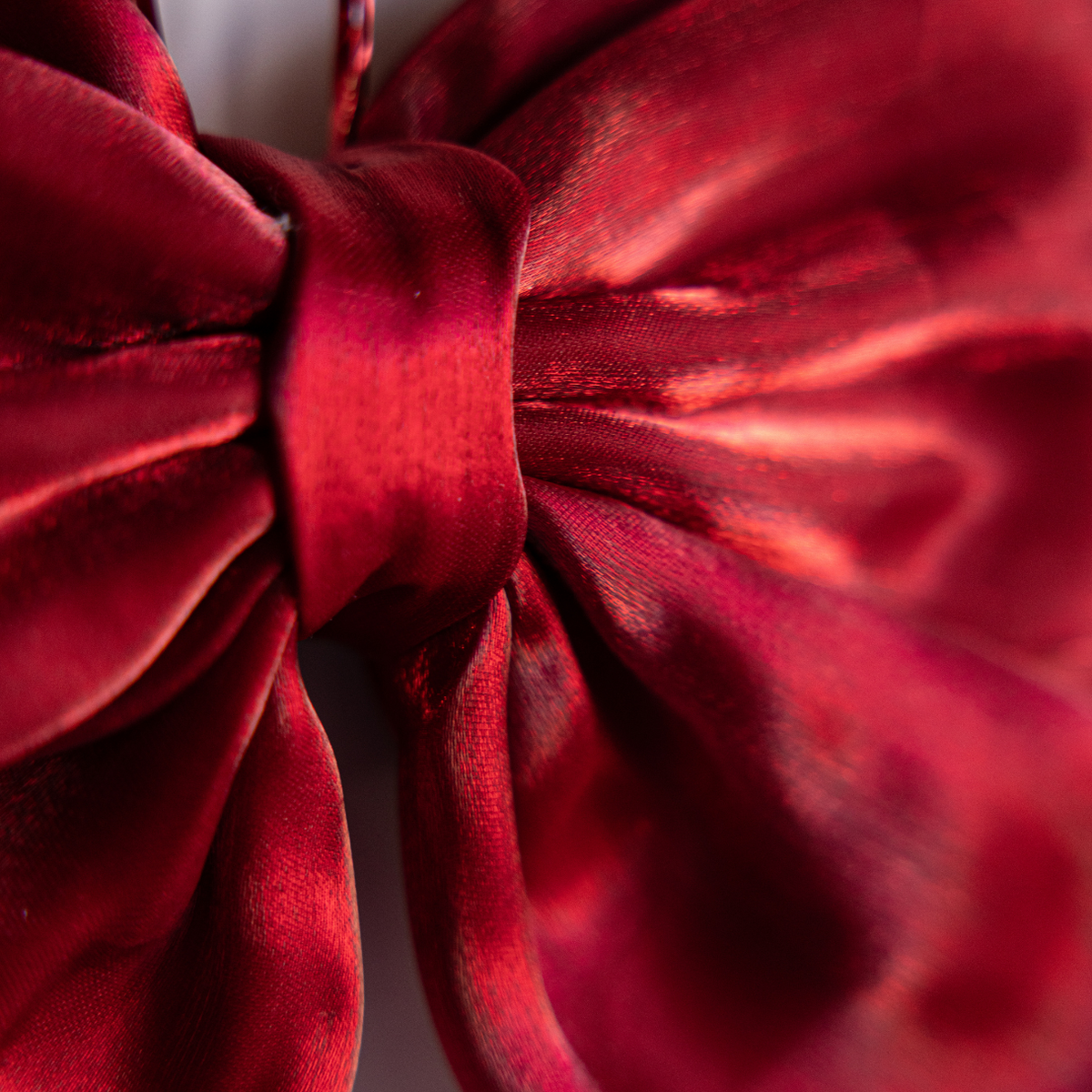 Red Gauze Bold Bow from Luxe B Co featuring a large, soft gauze fabric bow with a stylish, dramatic design.
