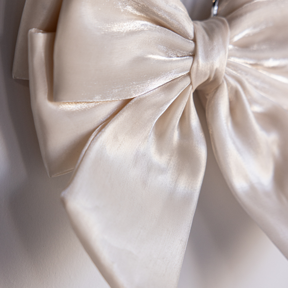 Cream gauze bold bow from Luxe B Co featuring soft fabric and large knot, perfect for hair accessories or decorative accents.