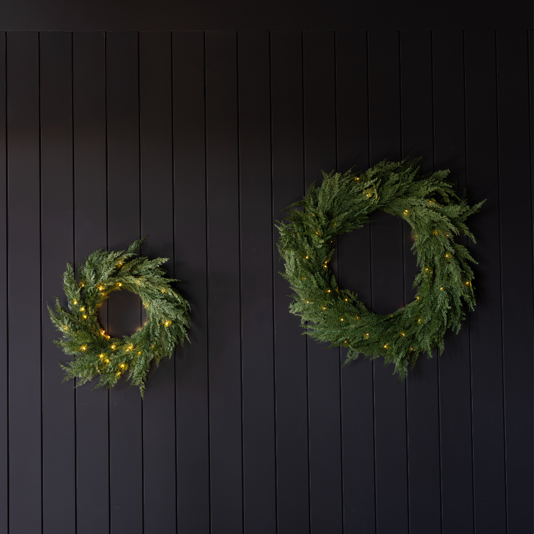 Luxe B Co Cypress Leaf Full Real Touch Wreath, 24-inch, with lush green faux cypress leaves arranged in a full circular design