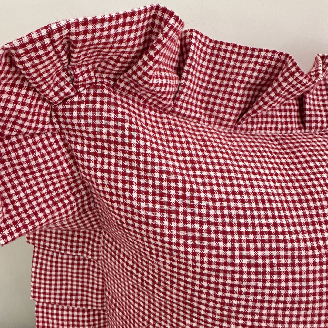 Red mini gingham lumbar pillow sham by Luxe B Co featuring ruffled edges, perfect for decorative throw pillows.