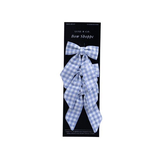 Set of blue small gingham mini fabric bows with clips from Luxe B Co, perfect for hair accessories and decorative use.