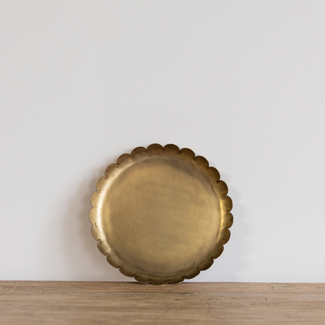 Aluminium scallop-shaped tray by Luxe B Co with brass-inspired finish, featuring a decorative scalloped edge design.