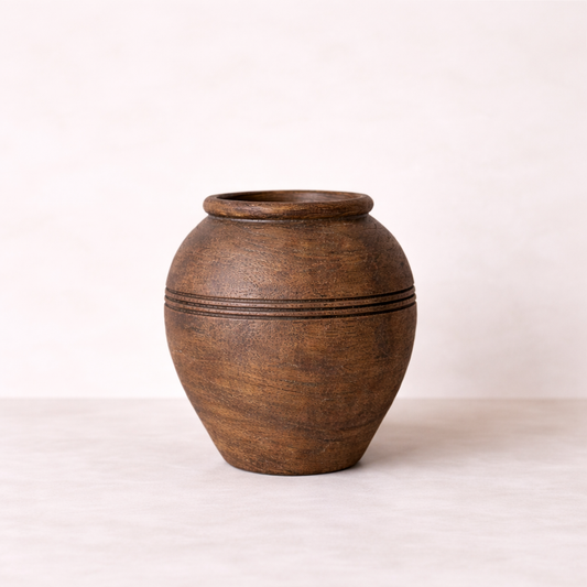 Brown ceramic vase on a white background