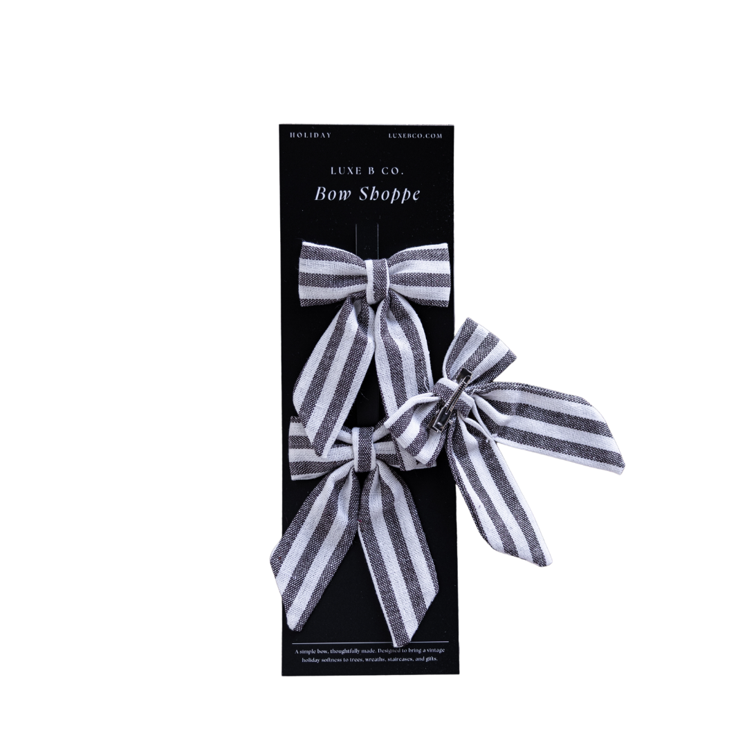 Set of brown striped mini fabric bows with clips by Luxe B Co, perfect for hair accessories or decorative use.