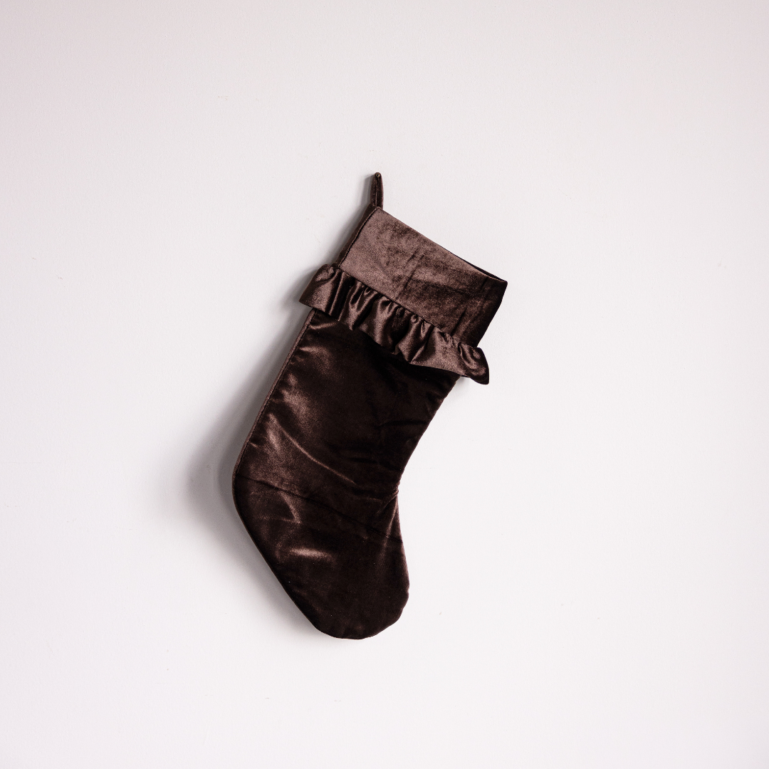 Brown velvet holiday stocking by Luxe B Co with plush texture and festive design, perfect for Christmas decorating.