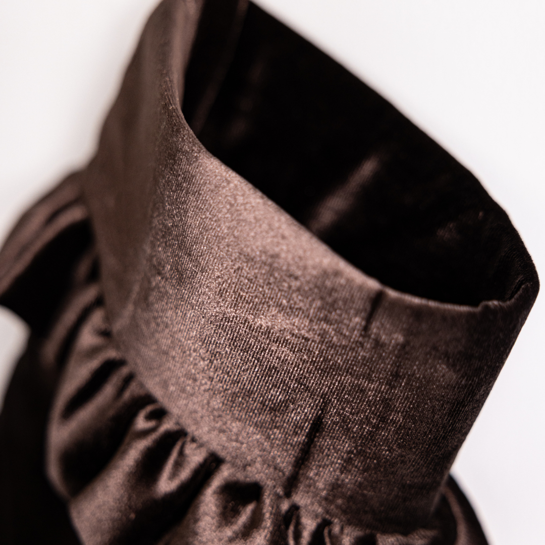 Brown velvet holiday stocking by Luxe B Co with festive holiday design and plush texture for Christmas decor.