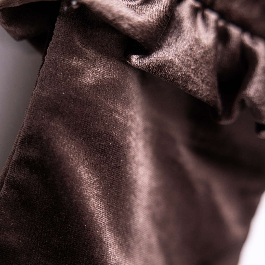 Brown velvet holiday stocking with plush texture, featuring a cozy and elegant design by Luxe B Co.