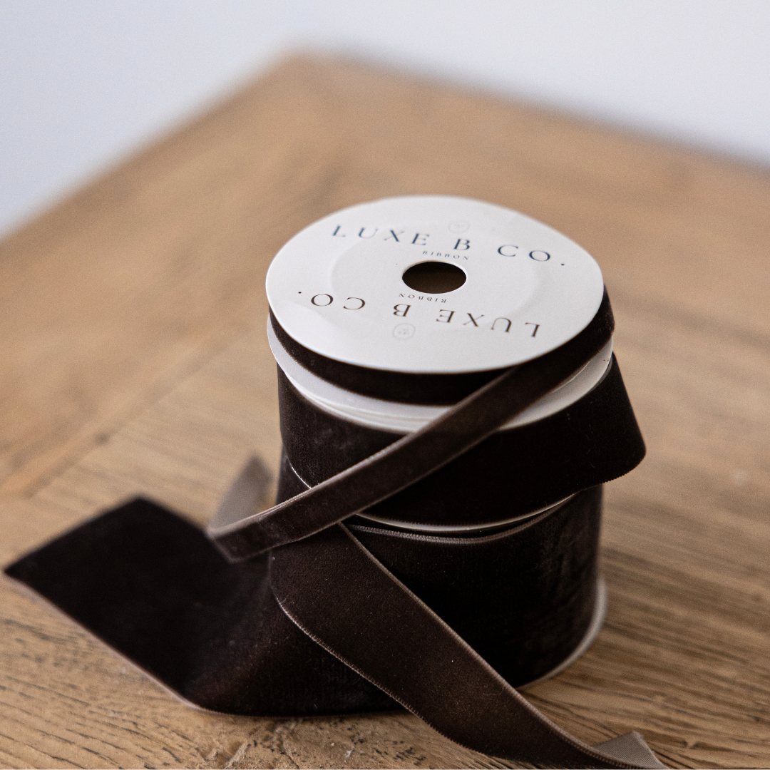 Brown velvet holiday ribbon by Luxe B Co, showcasing soft, luxurious fabric and festive design for gift wrapping or decorations.