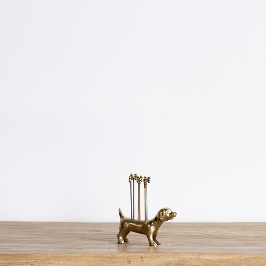 Brushed gold dog-shaped cocktail pick set by Luxe B Co, featuring decorative dog figures on elegant cocktail picks.