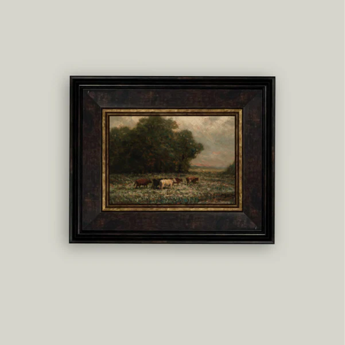 Antique-inspired framed art of grazing cattle by Luxe B Co, showcasing rustic, pastoral scene with detailed cattle and natural tones.