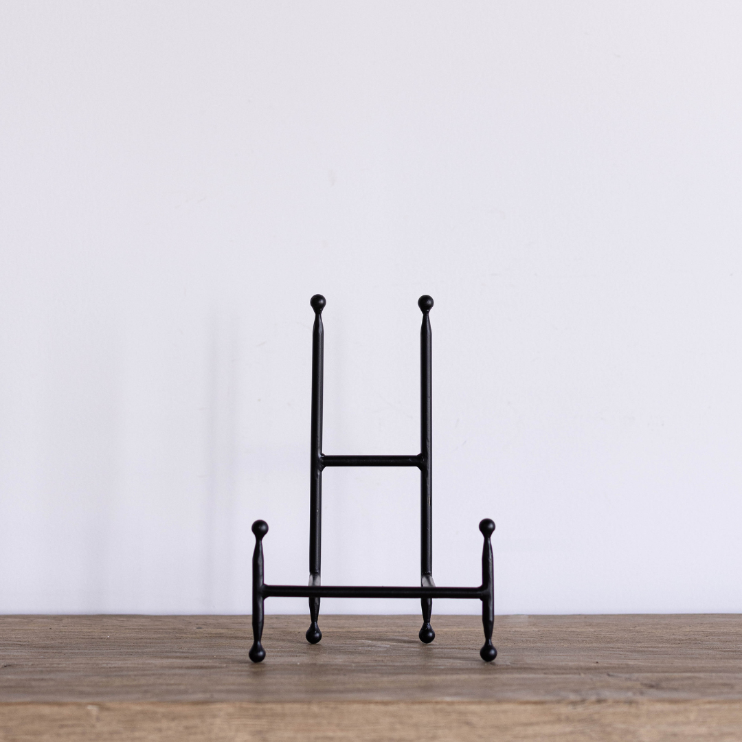 Iron cookbook stand by Luxe B Co featuring a sturdy iron frame, perfect for holding cookbooks and recipes in the kitchen.