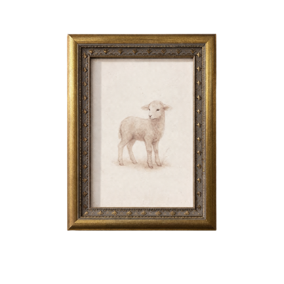 Antique-inspired brass mould framed art of a Little Meadow Lamb by Luxe B Co, showcasing detailed lamb illustration within a decorative frame.