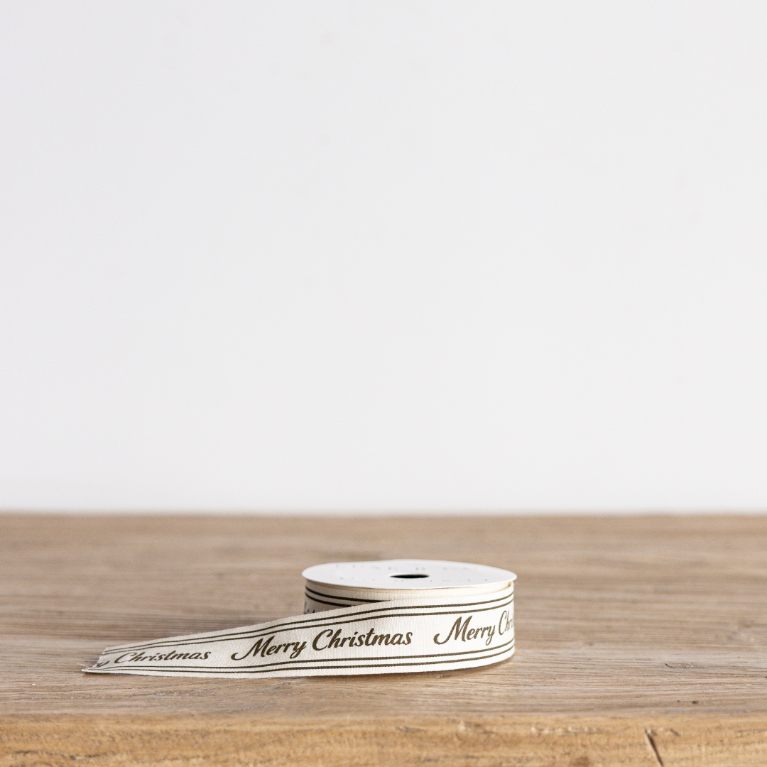 Olive green cursive writing Merry Christmas ribbon by Luxe B Co Wholesale, decorative holiday ribbon with festive script design.