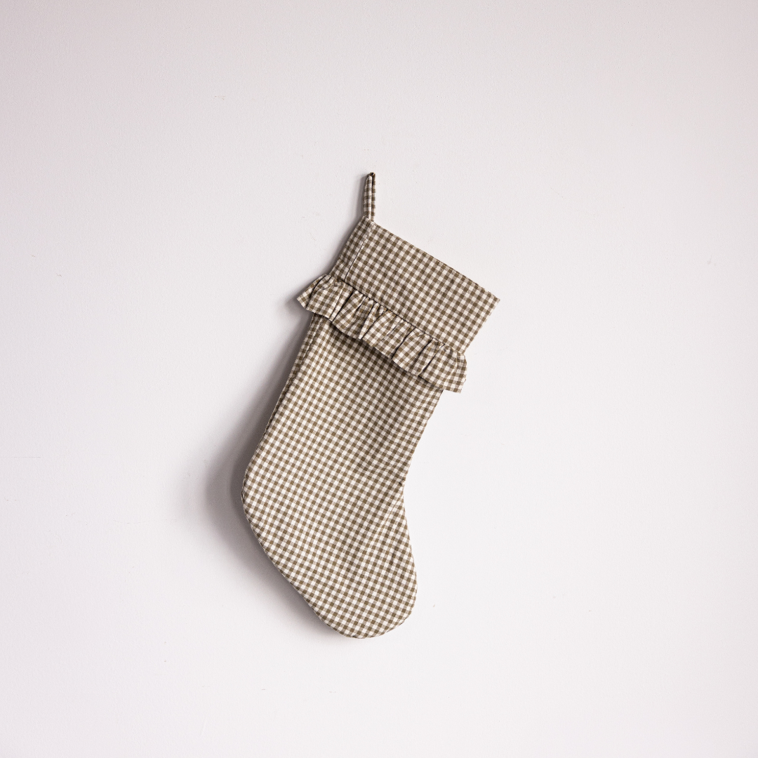 Olive gingham holiday stocking with a bow, designed by Luxe B Co, featuring festive and decorative Christmas stocking details.