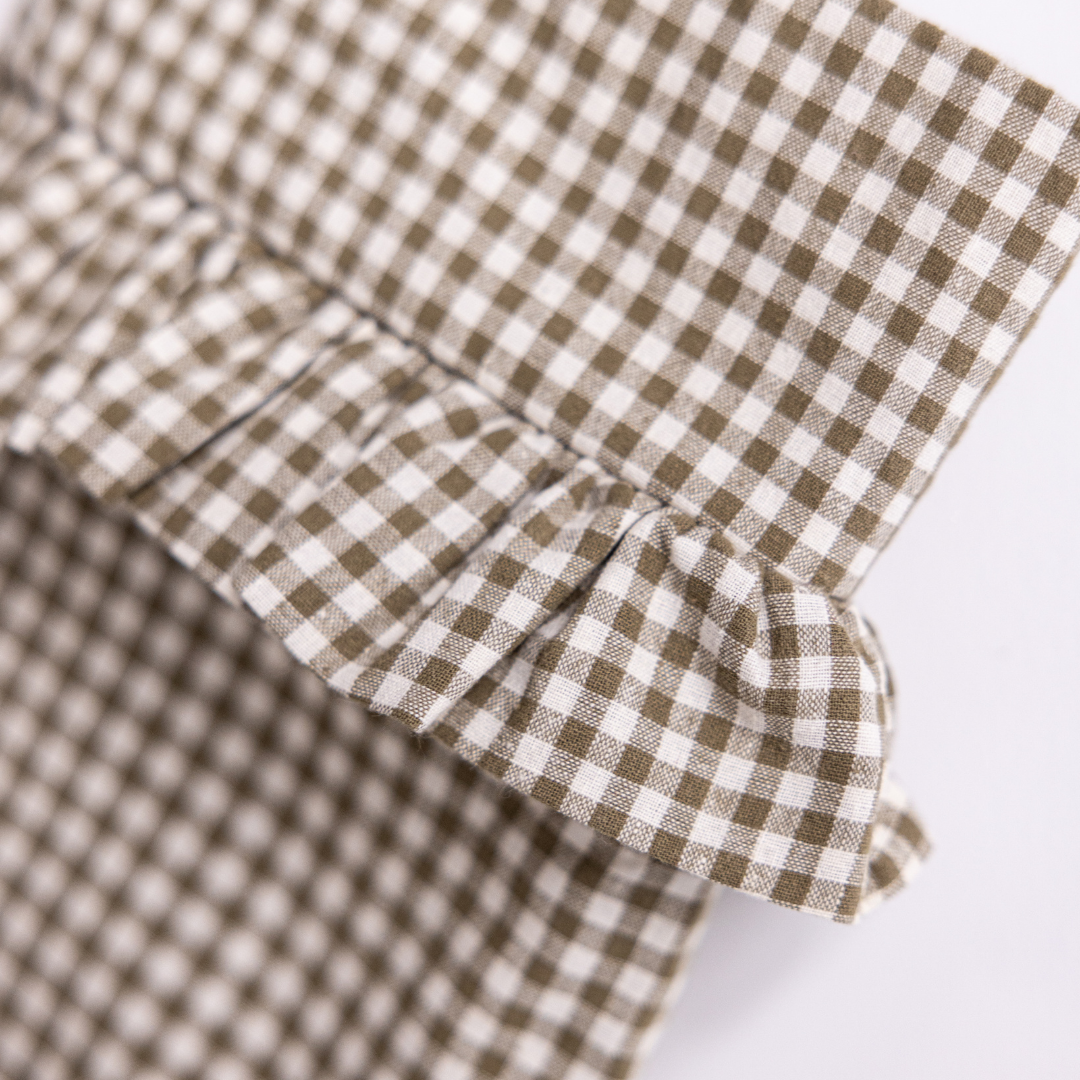 Olive gingham holiday stocking with bow detail by Luxe B Co, featuring festive pattern and cozy Christmas decor style.