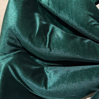 Large emerald green velvet bow by Luxe B Co, featuring oversized design and elegant material suitable for accessories or decorations.