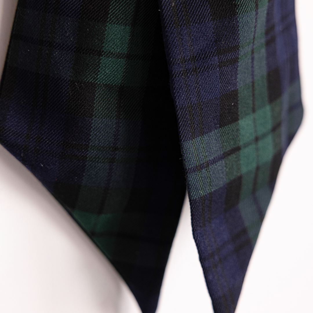 Green plaid fabric bows by Luxe B Co, featuring soft material and classic plaid pattern, perfect for accessories and crafts.