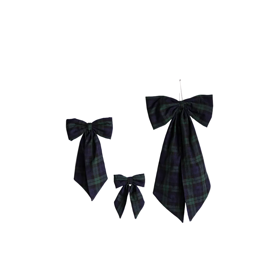 Green plaid fabric bows by Luxe B Co featuring classic pattern and soft material, perfect for accessorizing.