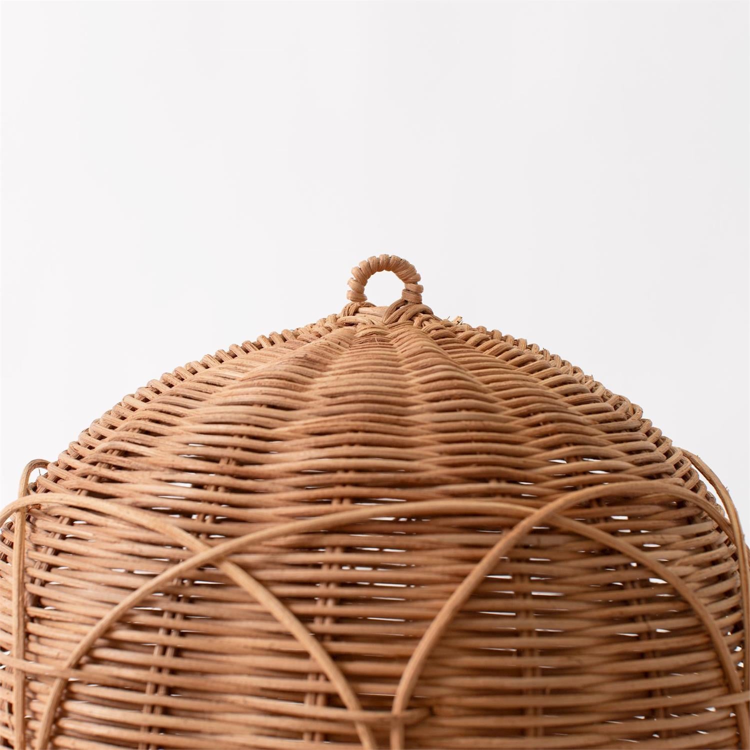Rattan hot air balloon decorative object by Luxe B Co., featuring intricate woven rattan design and a whimsical, floating appearance.