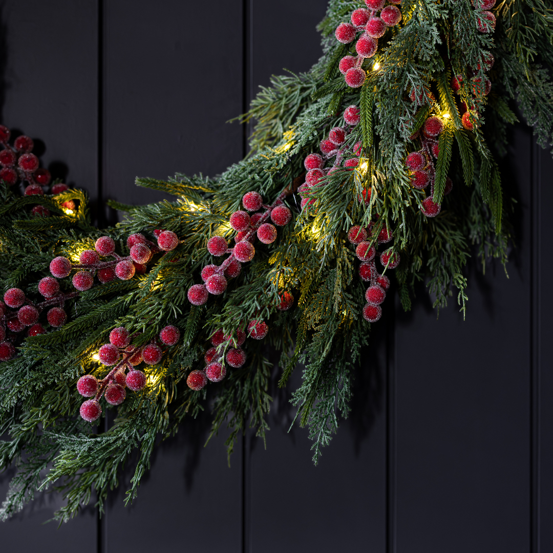 24-inch Red Plum Frosted Berry Norfolk Cypress real touch wreath by Luxe B Co with red plums, frosted berries, and Norfolk cypress greenery.