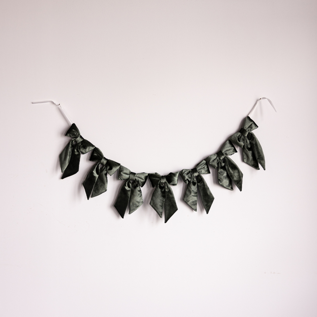 Sage green velvet bow garland with multiple bows, decorative and elegant for party or home decor, by Luxe B Co.