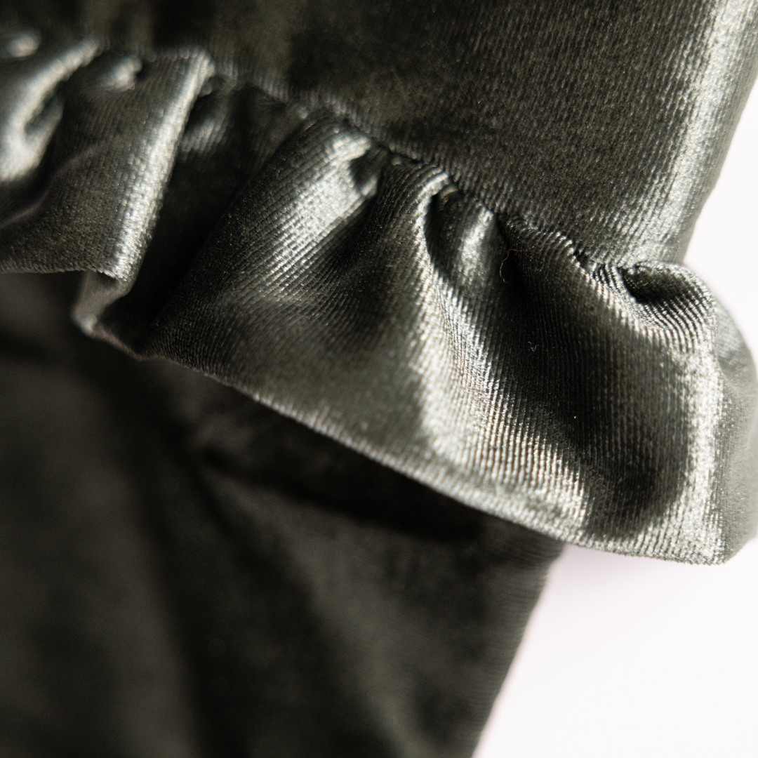 Sage velvet holiday stocking by Luxe B Co with plush texture and festive design, perfect for Christmas décor.