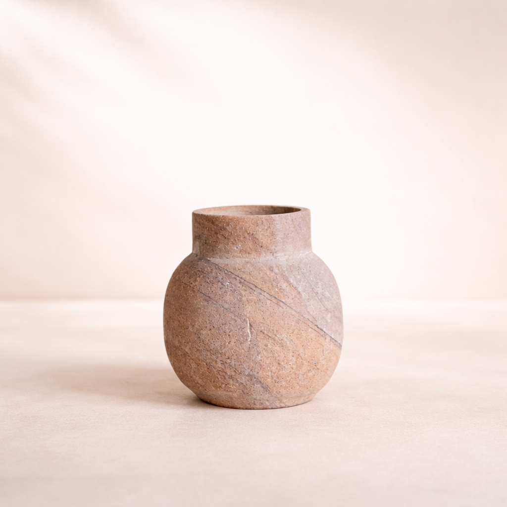 Stoneware vase on a beige background