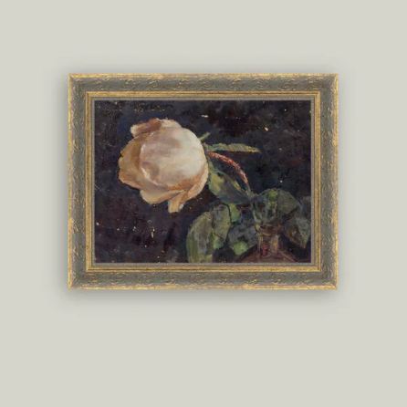 Framed antique-inspired art featuring a vase with a rose, created by Luxe B Co, showcasing elegant botanical design.