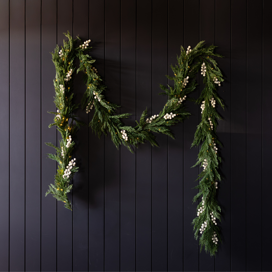 White Plum Frosted Berry Norfolk Cypress real touch garland, 15 ft, featuring white plums and frosted berries with lush greenery.