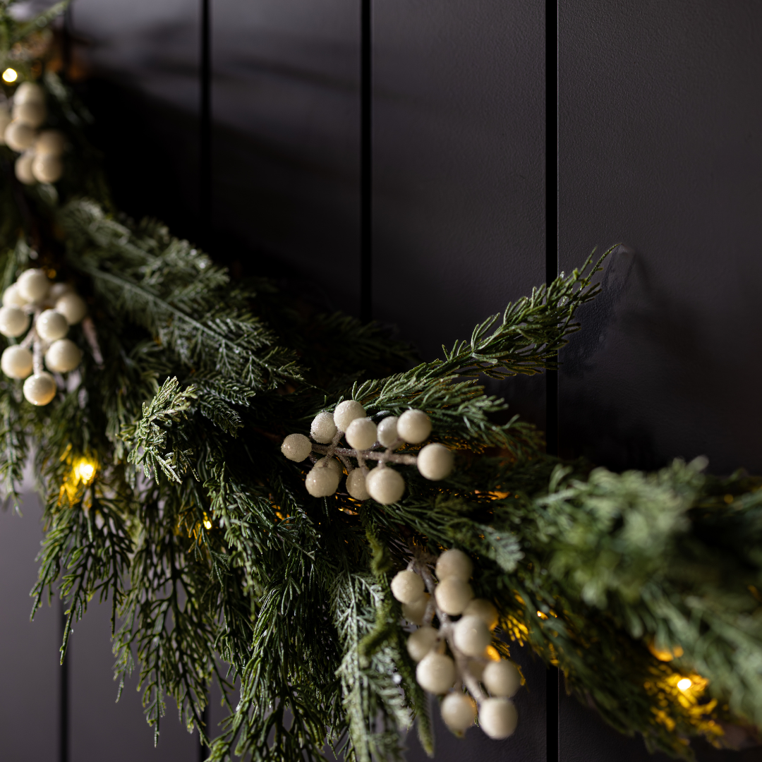 White plum and frosted berry Norfolk cypress real touch garland, 15 ft, with lush greenery and decorative berries, ideal for wreaths and décor.