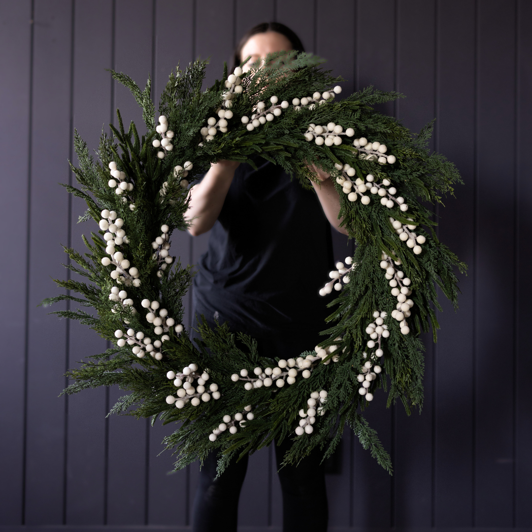 White Plum Frosted Berry Norfolk Cypress real touch wreath, 34-inch, featuring white plums, frosted berries, and green cypress branches.