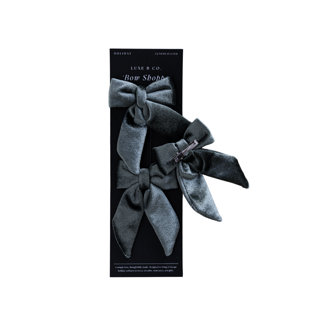 Set of sage green velvet mini fabric bows with clips, perfect for holiday or Christmas decor by Luxe B Co.
